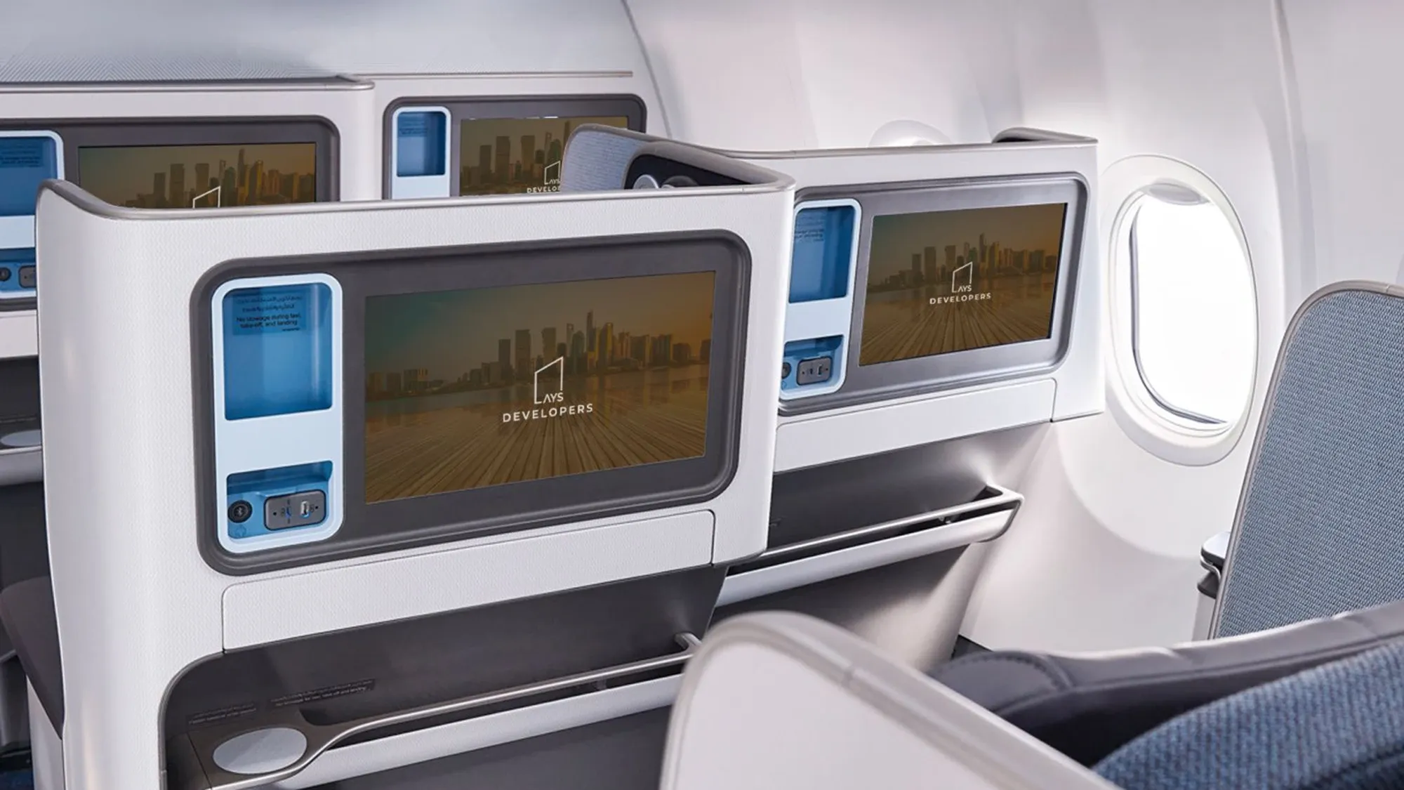 Digital in-flight out-of-home advertising screens for AYS Developers to promote their brand in a flydubai aircraft