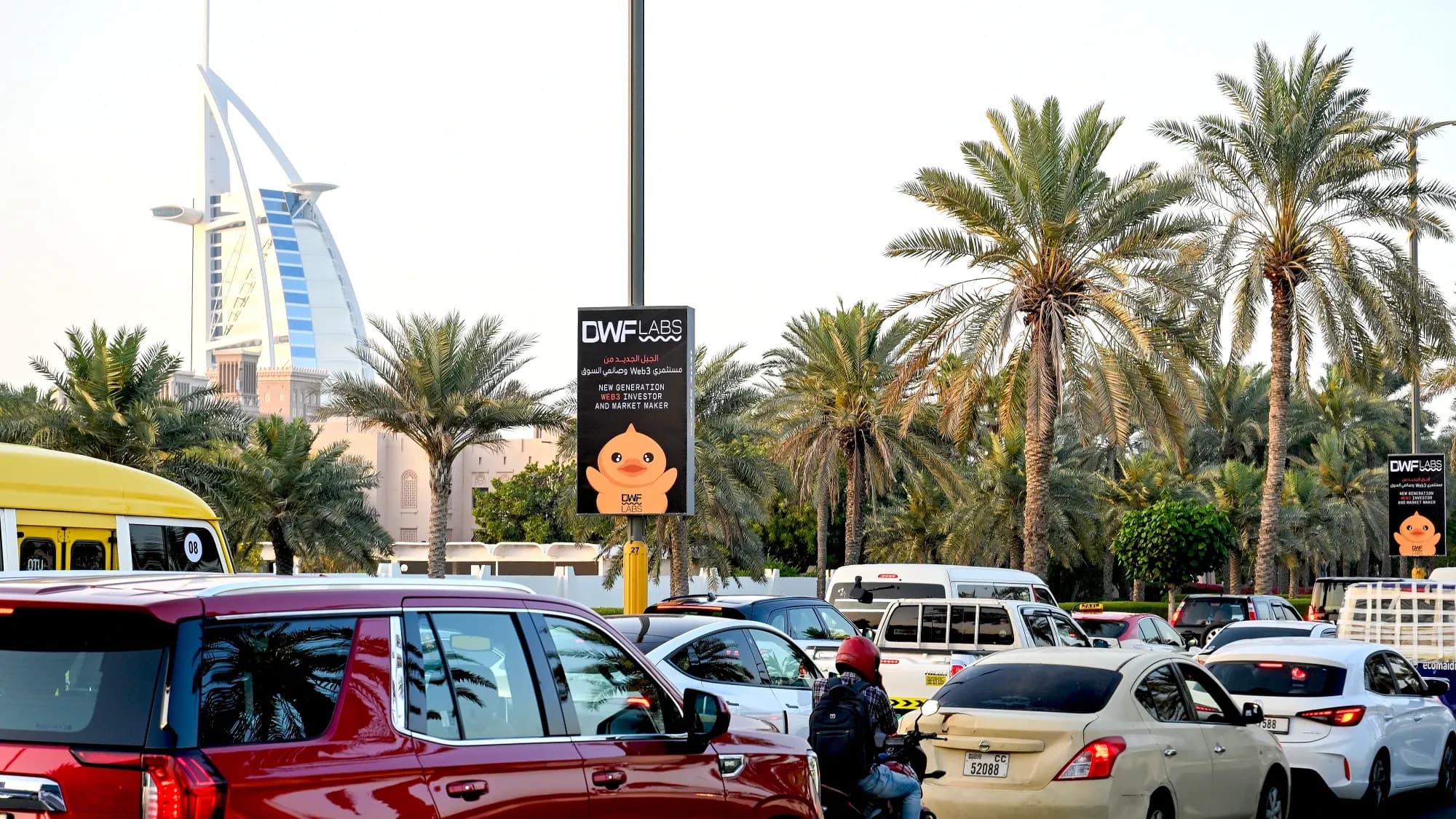 Lamppost banner advertising campaign for DWF Labs along key road in Jumeirah, Dubai